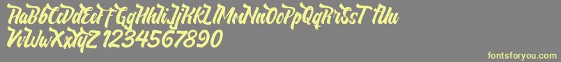 NeldaFree Font – Yellow Fonts on Gray Background