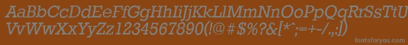 StaffordserialItalic-fontti – harmaat kirjasimet ruskealla taustalla