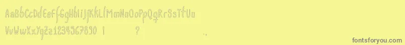 Acwanitaoutline Font – Gray Fonts on Yellow Background