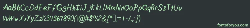 フォントCrappypeanuts – 黒い背景に緑の文字