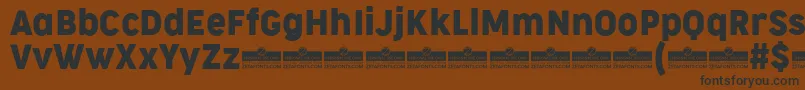 CocogooseNarrowRegularTrial Font – Black Fonts on Brown Background