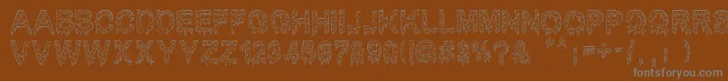 MisterMuerte-Schriftart – Graue Schriften auf braunem Hintergrund