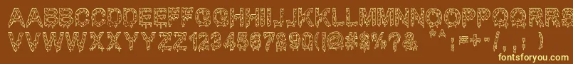MisterMuerte-Schriftart – Gelbe Schriften auf braunem Hintergrund
