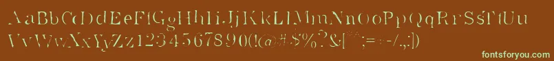 フォントSuperstar – 緑色の文字が茶色の背景にあります。