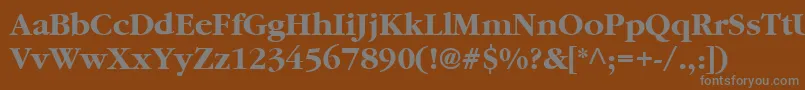 GaramondBold-fontti – harmaat kirjasimet ruskealla taustalla