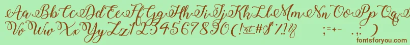 WinterCalligraphy-Schriftart – Braune Schriften auf grünem Hintergrund