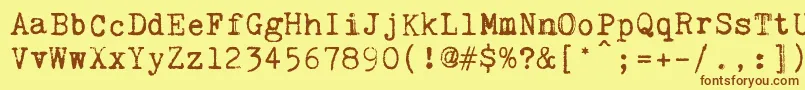 KingthingsTrypewriter2 Font – Brown Fonts on Yellow Background