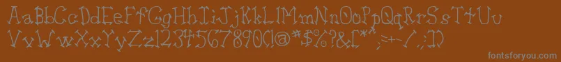 Aswell ffy-Schriftart – Graue Schriften auf braunem Hintergrund