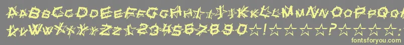 StarDustItalic-fontti – keltaiset fontit harmaalla taustalla