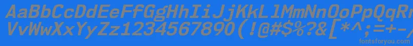 Nk57MonospaceNoBdIt-Schriftart – Graue Schriften auf blauem Hintergrund