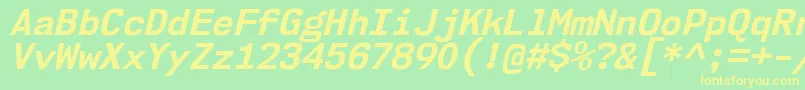 Nk57MonospaceNoBdIt-fontti – keltaiset fontit vihreällä taustalla