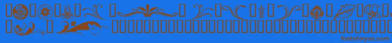 フォントFlorals – 茶色の文字が青い背景にあります。