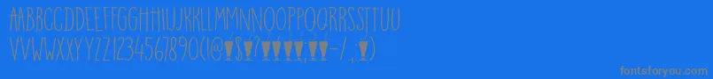 DkMangoSmoothie-Schriftart – Graue Schriften auf blauem Hintergrund