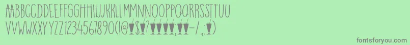 Czcionka DkMangoSmoothie – szare czcionki na zielonym tle