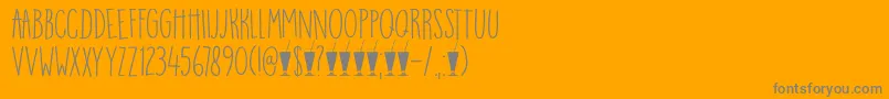 DkMangoSmoothie-Schriftart – Graue Schriften auf orangefarbenem Hintergrund