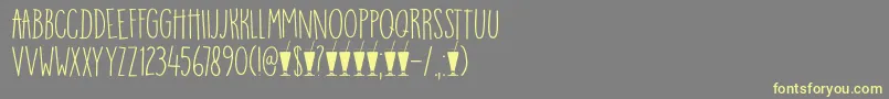 Czcionka DkMangoSmoothie – żółte czcionki na szarym tle