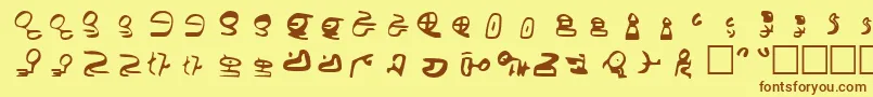 フォントId4AlienScript – 茶色の文字が黄色の背景にあります。