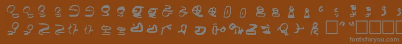 フォントId4AlienScript – 茶色の背景に灰色の文字