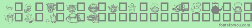 TeaTimeI-Schriftart – Graue Schriften auf grünem Hintergrund