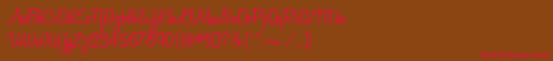フォントHoneyscript Semibold – 赤い文字が茶色の背景にあります。