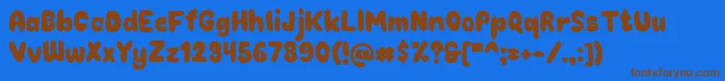 Chokoplain Font – Brown Fonts on Blue Background