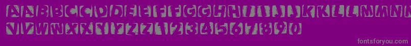 Woodcuttedcapsinvers-Schriftart – Graue Schriften auf violettem Hintergrund
