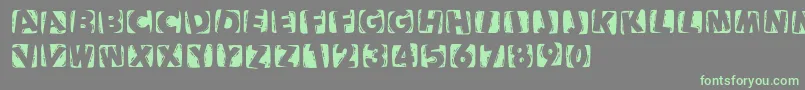 Подробнее о шрифте Woodcuttedcapsinvers Шрифт Woodcuttedcapsinvers – зелёные шрифты на сером фоне