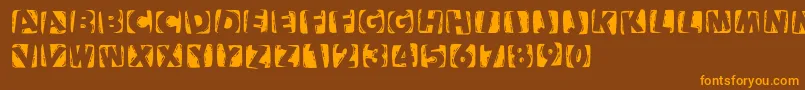 Шрифт Woodcuttedcapsinvers – оранжевые шрифты на коричневом фоне