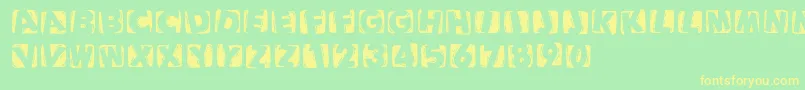 Woodcuttedcapsinvers Font – Yellow Fonts on Green Background