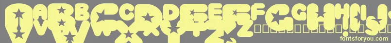 Fonte CrystaluniverseRegular – fontes amarelas em um fundo cinza