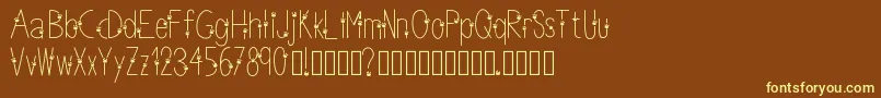 Thinpaws-fontti – keltaiset fontit ruskealla taustalla