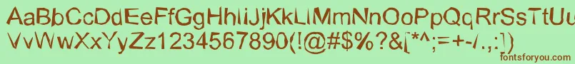 WobblyNormal Font – Brown Fonts on Green Background