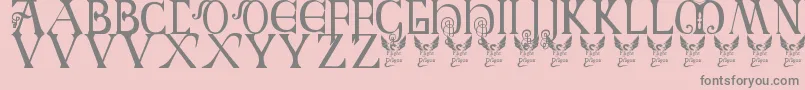 Czcionka Britishblockflourish – szare czcionki na różowym tle