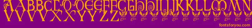 Czcionka Britishblockflourish – pomarańczowe czcionki na fioletowym tle