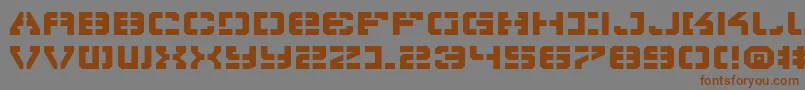 フォントVypere – 茶色の文字が灰色の背景にあります。