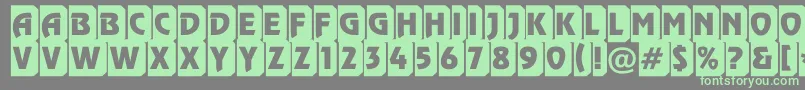 フォントRewinderttl3DtumbaRegular – 灰色の背景に緑のフォント