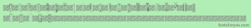 Metalblocktango Font – Gray Fonts on Green Background