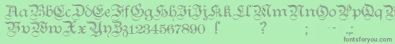 TeutonicNo2Demibold-fontti – harmaat kirjasimet vihreällä taustalla
