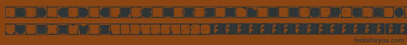 Шрифт AntiBiased – чёрные шрифты на коричневом фоне