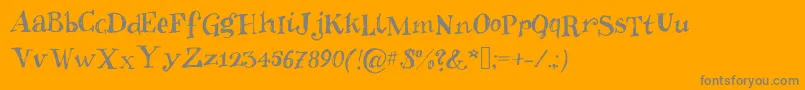 Inkies2-Schriftart – Graue Schriften auf orangefarbenem Hintergrund