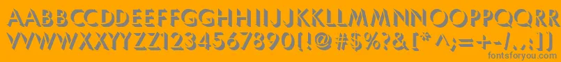 Umbles-fontti – harmaat kirjasimet oranssilla taustalla