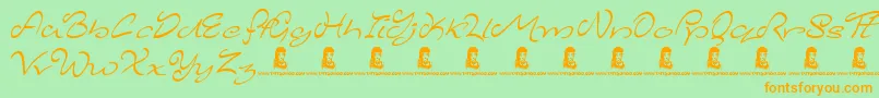 フォントMajesticMansion – オレンジの文字が緑の背景にあります。