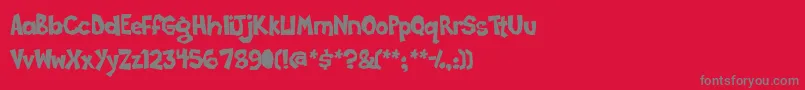 Poppycock Font – Gray Fonts on Red Background