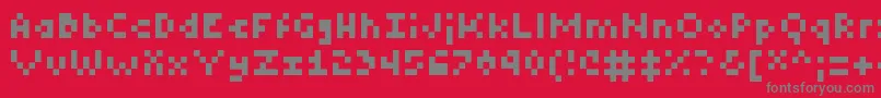 フォントTinyRegular – 赤い背景に灰色の文字