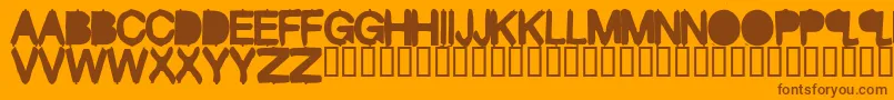 BlackMass-Schriftart – Braune Schriften auf orangefarbenem Hintergrund