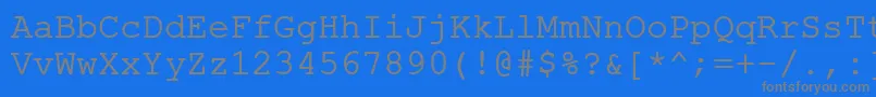 ErKurier1251Normal Font – Gray Fonts on Blue Background