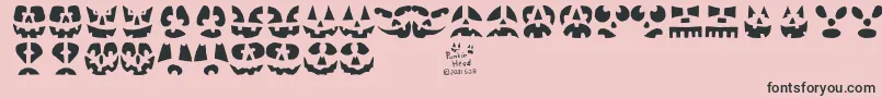 Police Punkinhead – polices noires sur fond rose