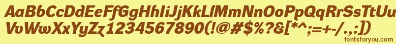 DynagroteskdeBolditalic-fontti – ruskeat fontit keltaisella taustalla