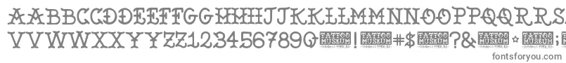 TattooMuseum-fontti – harmaat kirjasimet valkoisella taustalla