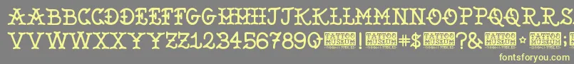 TattooMuseum Font – Yellow Fonts on Gray Background